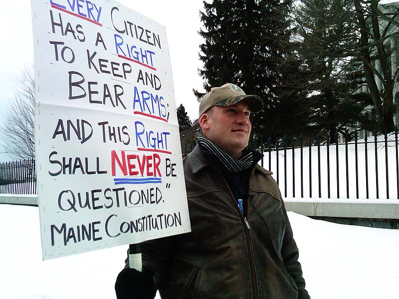 Michael Hein of Augusta takes part in a rally at the State House in Augusta as part of Gun Appreciation Day events held Saturday around the country in response to President Obama’s gun-control proposals.