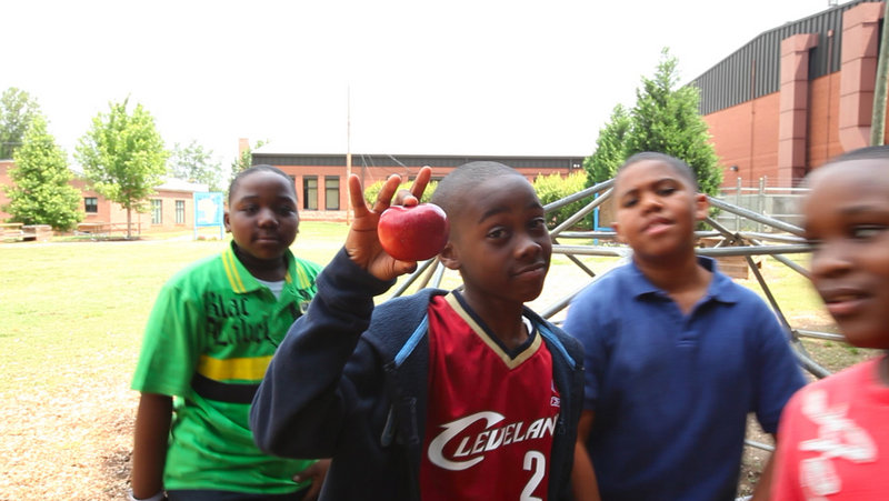 Hutchinson Elementary fifth-graders Marshall Jackson, Jayquan Jones, Robert Couch and Carmani Brown, calling themselves The ShortyZ, won the Dunk the Junk rap contest.