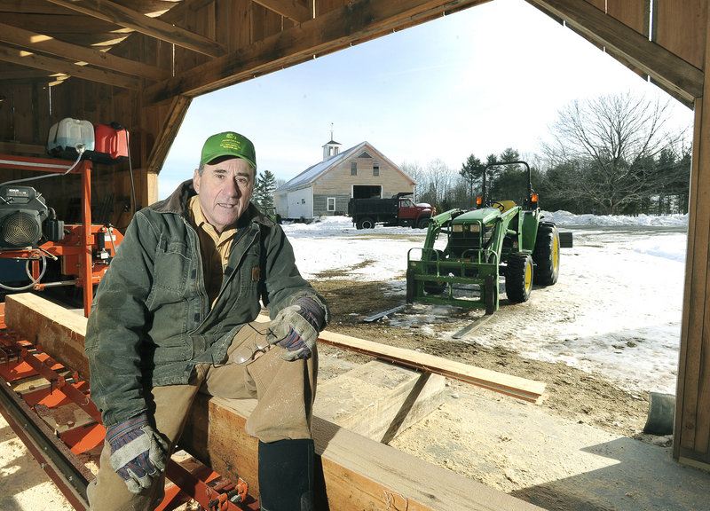 Charles Harrison, 73, seen Friday at his farm in Lyman, owns five guns and says there should be no government restrictions on gun ownership. "As far as regulations, what we have now is pretty good," Harrison says.