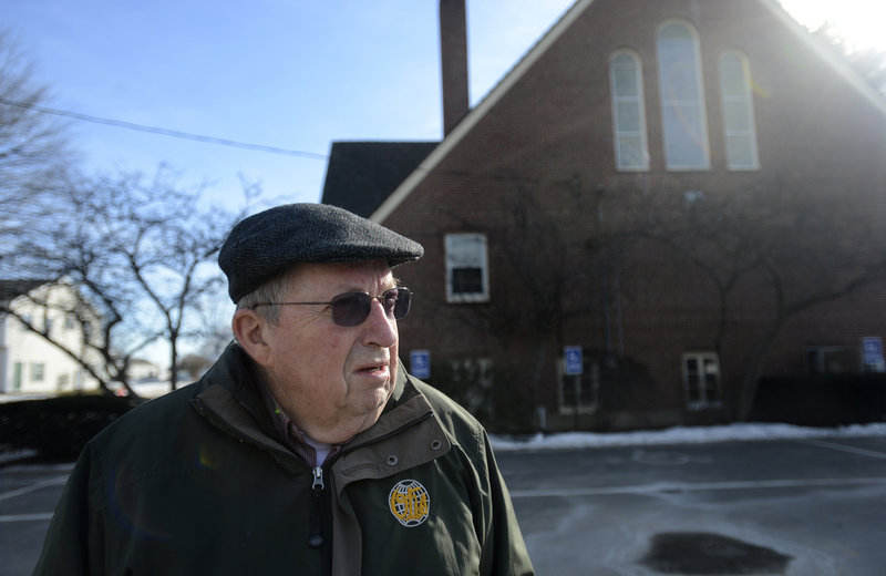 Parishioner John Labrie of South Portland discusses the potential closure of St. John the Evangelist Church in South Portland Thursday, January 24, 2013. The church has been recommended for closure by the finance commission for the Catholic parish in South Portland.