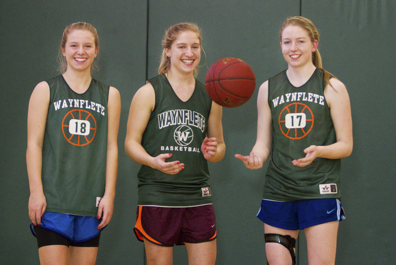 This year there are three Veroneaus playing girls’ basketball for Waynflete – freshman Anne, left, and the senior twins, Martha, center, and Catherine. And a state title is possible.