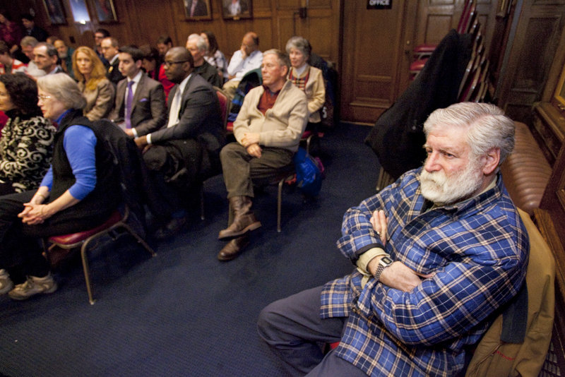 Residents watch as Portland Mayor Michael Brennan gives his first State of the City Address on Monday, Jan. 28, 2013.