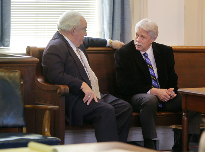 Mark Strong, Sr. talks with his attorney Dan Lilley after Justice Nancy Mills dropped 46 charges against Strong at York County Superior Court in Alfred on Thursday morning, January 24, 2013. The Maine Supreme Court will hear an appeal to reinstate those charges.