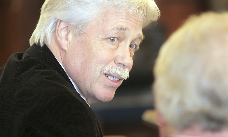 Mark Strong, Sr. talks with his lawyer Daniel Lilley at York County Superior Court in Alfred last month.
