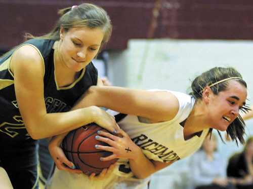 GIVE IT TO ME: Richmond’s Jamie Plummer, right, pulls the ball away from Rangeley’s Jenney Abbott in an earlier game. The Bobcats and the Lakers are on a collision course in the Western Class D tournament.