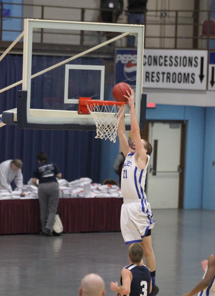 Carrington Miller dunks in the second half of Valley's Western D quarterfinal win over Greenville on Saturday in Augusta.