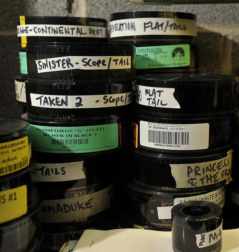 Old-fashioned 35 mm film reels at the Saco Drive-In theater. Like many drive-ins and old movie theaters, if the Saco Drive-In doesn't make the $90,000 switch to digital, it will likely have to shutter.