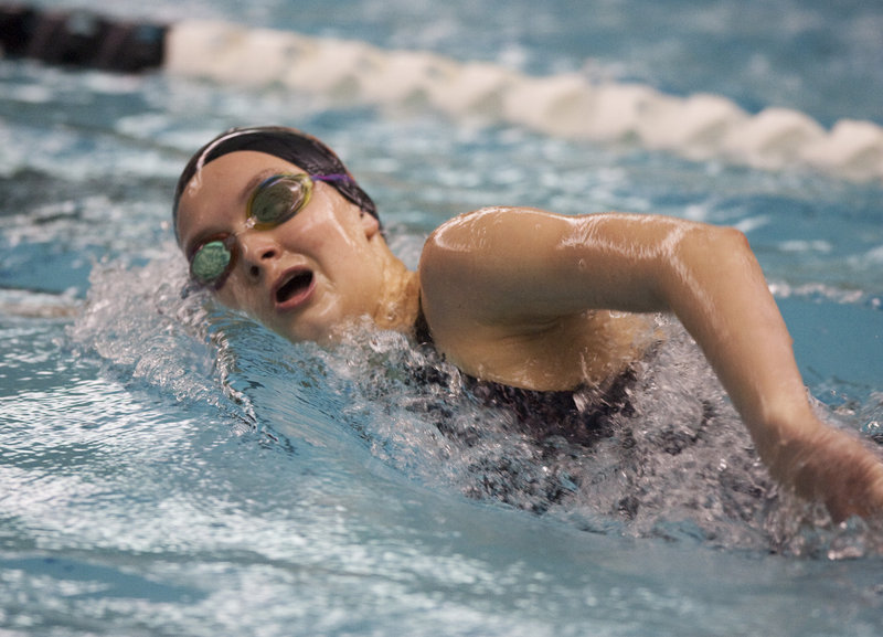 Lynsie Russell of Brunswick heads to the finish while competing in the grueling 500-yard freestyle. Russell, a freshman, won the event in 5 minutes, 25.64 seconds – exactly 13 seconds ahead of the runner-up, Alyssa Reardon of Bangor.