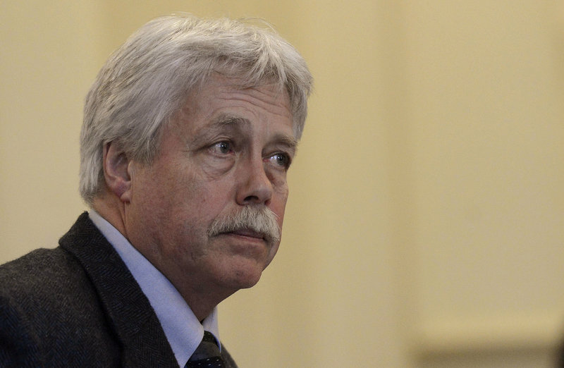 Mark Strong Sr. listens to opening statements Wednesday during the first day of his trial in the Kennebunk prostitution case.