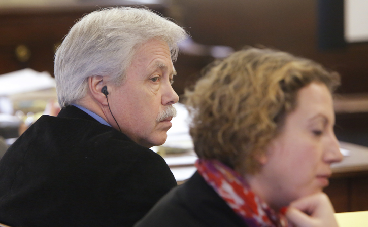 Mark Strong Sr. listens as his attorney, Daniel Lilley, asks Justice Nancy Mills to dismiss charges against him in York County Superior Court in Alfred on Tuesday.