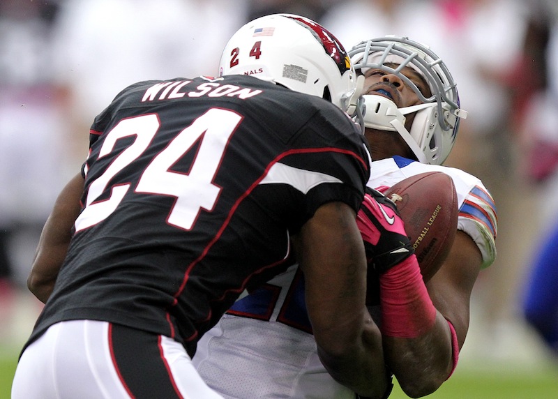 Arizona Cardinals strong safety Adrian Wilson (24) levels Buffalo Bills running back Fred Jackson during the first half of an NFL football game in Glendale, Ariz., in October. With Wilson at strong safety, the New England Patriots have a new physical presence in the secondary. The newly signed Wilson, who spent the last 12 seasons with the Cardinals, signed with the Patriots as a free agent.