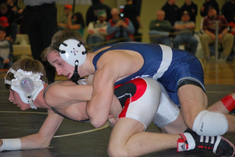 Connor Sheehan, right, didn’t know if he’d be able to wrestle again this winter after he broke his ankle on Dec. 1. Three months later, he’s a New England champion.