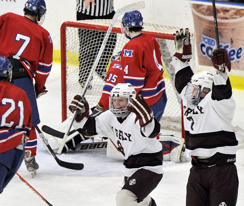 Reid Howland, left, and Mitchel Donovan of Greely show their joy as the Rangers moved a step closer to the state title with their second goal in what turned out to be a 3-0 victory against Messalonskee.