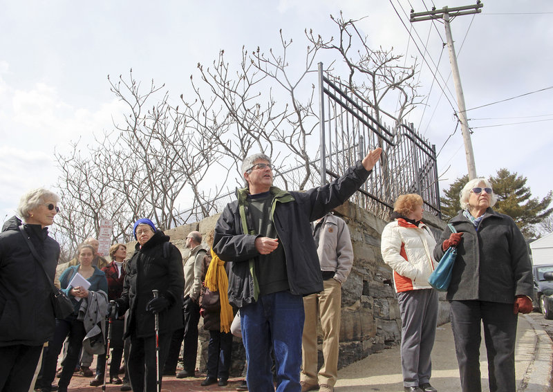 Bill Needelman, senior planner with the city of Portland, pauses at the corner of Federal and Mountfort streets during a walking tour of the India Street neighborhood. The tour was part of an informal open house as groups consider the future of the neighborhood.