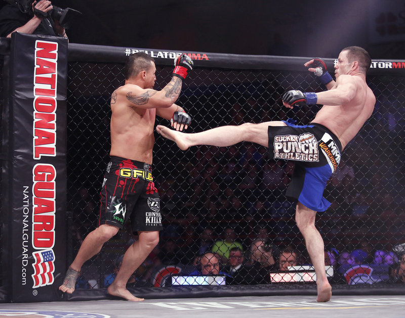 Marcus Davis unleashes a sidekick during a welterweight fight against Waachiim Spiritwolf as part of the Bellator MMA show at the Androscoggin Bank Colisee in Lewiston on Thursday night.