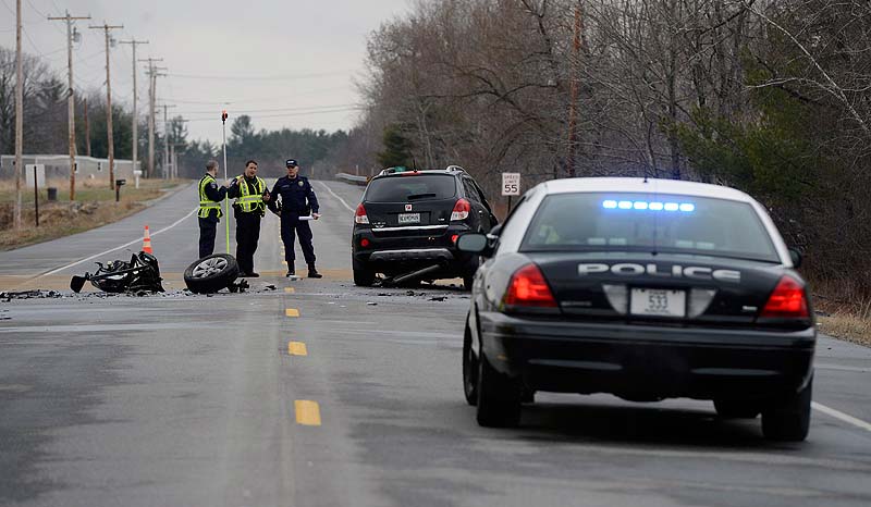 An accident reconstruction team examines the scene of a fatal crash on Route 4 in Berwick on Wednesday.