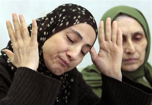 The mother of the two Boston bombing suspects, Zubeidat Tsarnaeva, left, speaks at a news conference last week in Makhachkala, the southern Russian province of Dagestan.