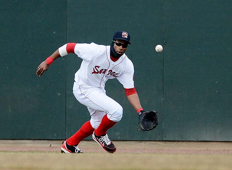 Left fielder Tony Thomas of the Sea Dogs fields a hit against the Trenton Thunder Sunday at Hadlock Field. Portland lost, 9-7.