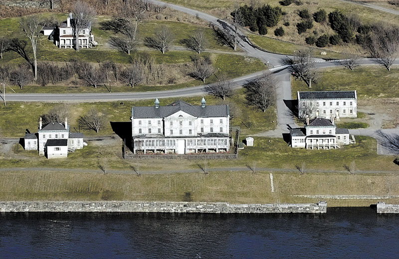 Staff photo by Joe Phelan This 2007 file aerial photo shows the Kennebec Arsenal in Augusta. It was taken during a minor spring flood and so the granite pier, bottom right, is covered by Kennebec River. kennebec arsenal aerial business government hallowell warm weather