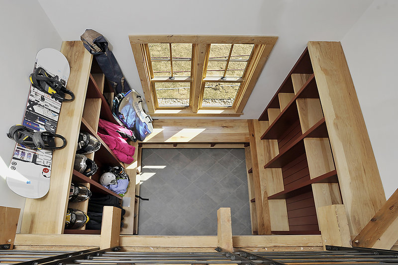 A view from the second floor of Christopher Michael Martell’s Scarborough mudroom, which was designed and built by Caleb Johnson Architects + Builders.