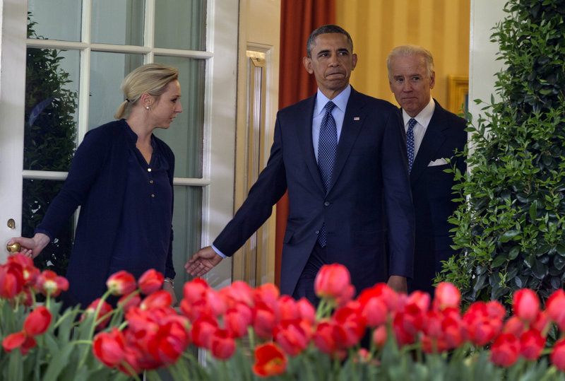 President Obama and Vice President Biden arrive for a news conference Wednesday after the vote on the background checks bill.