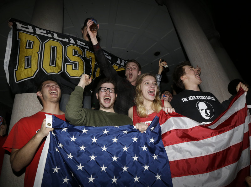 A crowd gathers at Boston Common after Dzhokhar Tsarnaev, the second suspect in the Boston Marathon bombings, was captured Friday in Watertown, Mass., ending a manhunt that brought the Boston area to a near standstill.