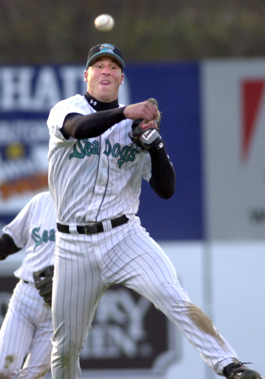 Staff Photo by Gordon Chibroski, Friday, April 27, 2001: Sea Dogs' third baseman, Heath Honeycutt fires a grounder to first base for an out in the 3rd inning in a game against the New Britain Rock Cats.. Baseball Gordon Chibroski