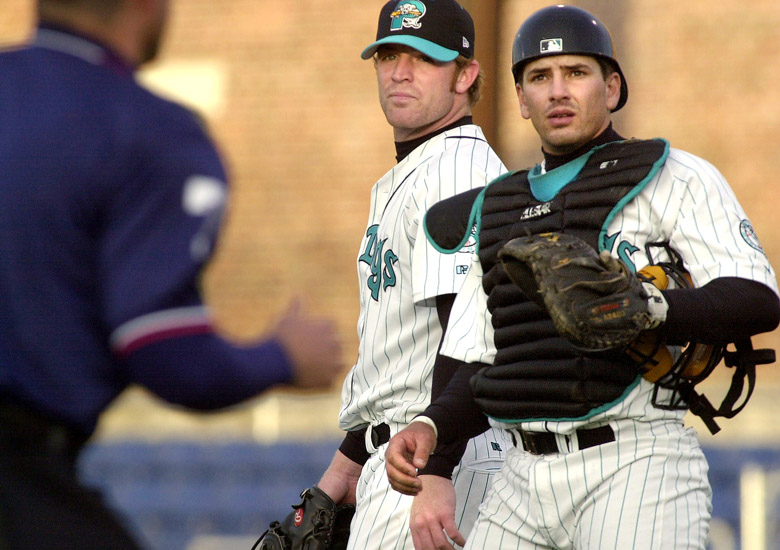 Staff Photo by John Ewing, Tue, Apr 16, 2002: Sea Dogs catcher Matt Treanor looks to the umpire for a new ball after starting pitcher Nate Robertson gave up the second of back to back home runs in the second inning against the New Haven Ravens. John Ewing Baseball portland sea dogs