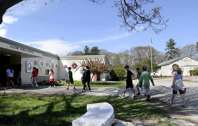 Students file into Hall Elementary School in Portland. The state is promising $30 million to help replace Hall Elementary and fix Longfellow Elementary, according to Portland's finance director.