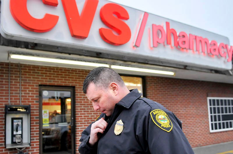 Augusta Police Dept. Lt. Christopher Massey speaks on the radio moments after arriving at a CVS Pharmacy robbery on Capitol Street in Augusta in November 2012. Statistics released Wednesday, May 29, 2013 indicate that pharmacy robberies are on the rise, a troubling sign in an otherwise very safe state.