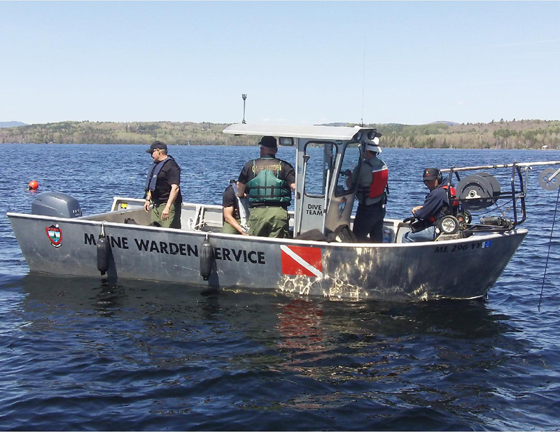 The search for two missing snowmobilers ended Wednesday when Maine Warden Service dive team members recovered the bodies of Kenneth Henderson, 40, of China, and John Spencer, 41, of Litchfield, from Rangeley Lake.