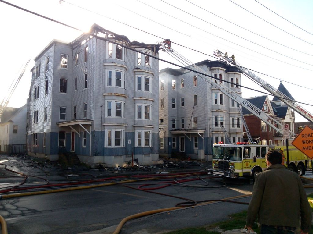 Authorities say more than 100 firefighters responded to the scene of a blaze on Bartlett Street reported at about 3 a.m. Monday.