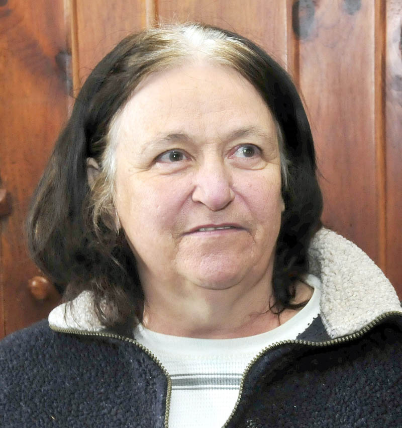 Cindy Smith organized a walk on the shores of Rangeley Lake last week to find any artifacts related to three missing snowmobilers, presumed drowned in the lake in December. "I did this to help prevent any trauma from someone finding evidence of the men," Smith said on Tuesday.