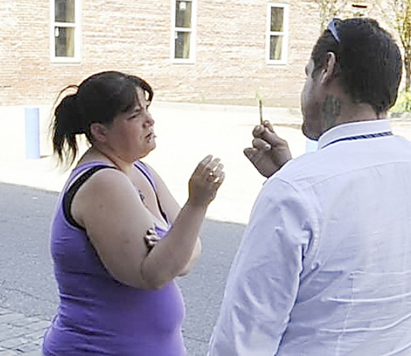 Charles Epps and Jessica Reilly take a break from the court session deciding on the legal detainment of her son Brody Covey, who is accused of starting fires in Lewiston. Epps is the live-in boyfriend and father of her two younger girls.