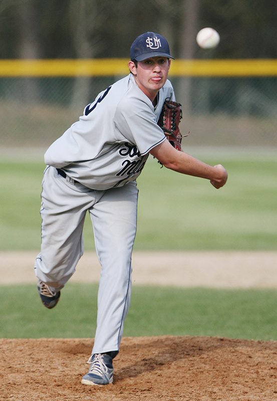 Andrew Richards pitches in relief Saturday during the game against Endicott College in the NCAA Division III New England baseball tournament in Harwich, Mass.