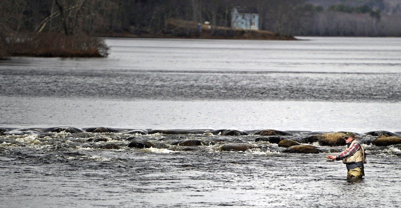 In this April 2012 file photo, Mike Gundel of Rockland fishes the St. George's River in Appleton for trout. Volunteer anglers are being sought to survey remote ponds and lakes around Maine in search of brook trout.