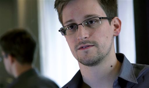 This photo provided by The Guardian Newspaper in London shows Edward Snowden, who worked as a contract employee at the National Security Agency, on Sunday, June 9, 2013, in Hong Kong. The Guardian identified Snowden as a source for its reports on intelligence programs after he asked the newspaper to do so on Sunday. (AP Photo/The Guardian)