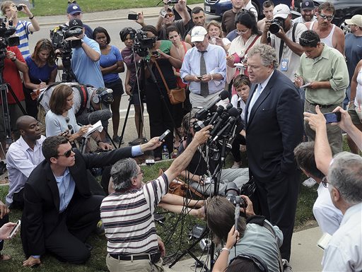 Michael Fee, defense attorney for former New England Patriots tight end Aaron Hernandez, speaks to the media outside Attleboro District Court after Hernandez was arraigned Wednesday in Attleboro, Mass.