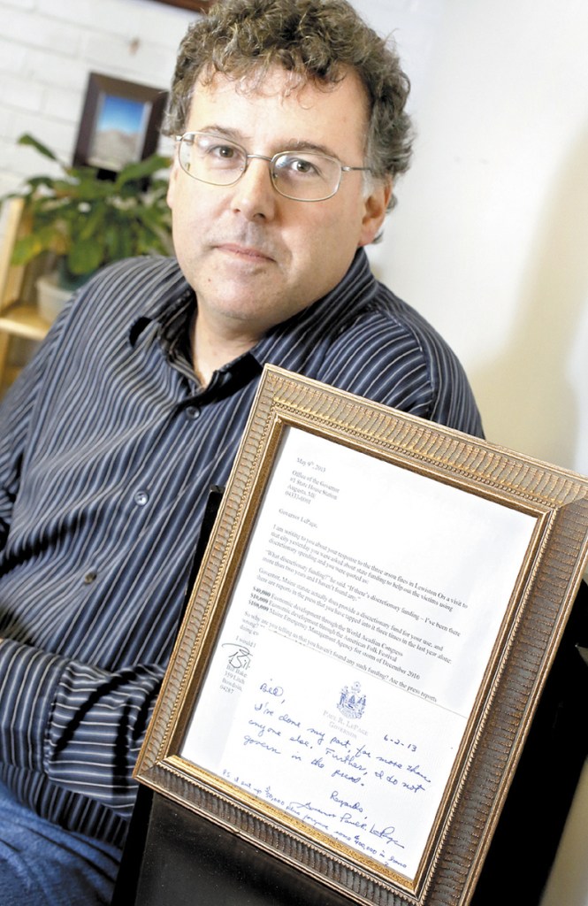 Bill DiGiulio with the letter he wrote to Governor LePage and the handwritten letter in response from the governor in his office in Portland on June 12.