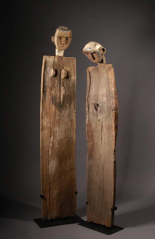 From Sukuma, Tanzania, “Guardian Post,” circa 1900, wood, metal and hide.