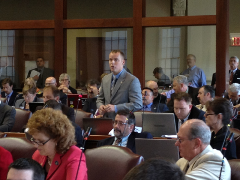 Rep. Corey Wilson, R-Augusta, announces on the floor of House he will vote to override the governor's veto of the state budget.