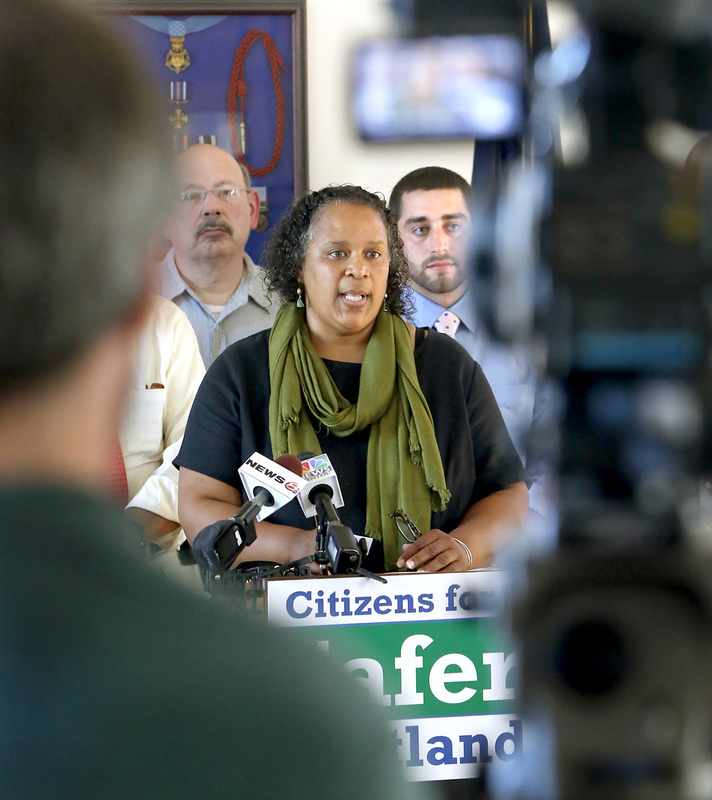 Regina Phillips, an NAACP of Maine board member, speaks during a news conference on making marijuana legal in Portland on Monday.