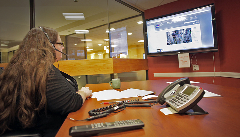 Press Herald Staff Writer Gillian Graham interviews astronauts Chris Cassidy, who is from Maine, and Karen Nyberg via a live NASA video stream from the Space Station on Thursday.