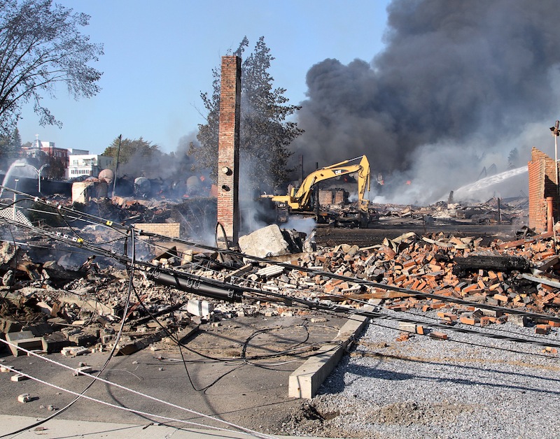 This photo provided by Surete du Quebec, shows debris from a runaway train on Monday, July 8, 2013 in Lac-Megantic, Quebec, Canada. A runaway train derailed igniting tanker cars carrying crude oil early Saturday, July 6. At least thirteen people were confirmed dead and nearly 40 others were still missing in a catastrophe that raised questions about the safety of transporting oil by rail instead of pipeline. (AP Photo/Surete du Quebec, The Canadian Press) Canada Quebec Montreal;transportation;business;Canada;Canadian;economic;economy;industry;move;ship;shipping;transit;transport;travel industry;commerce;tourism;fire;train;rail;derail;tragedy;disaster