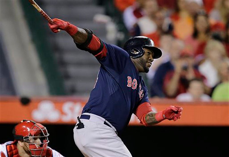 Red Sox DH David Ortiz hits a two-run home run against the Los Angeles Angels in the eighth inning in Anaheim, Calif., on Friday.