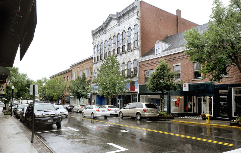 Ackerman is renovating the former Renys store, center, to turn it into an arts and design center.