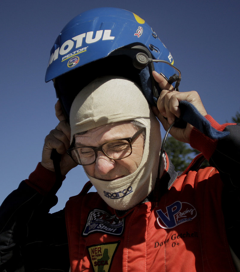 Dave Getchell, co-driver for Last Ditch Racing, dons his racing helmet before departing for the Sunday River Super Special Stage.