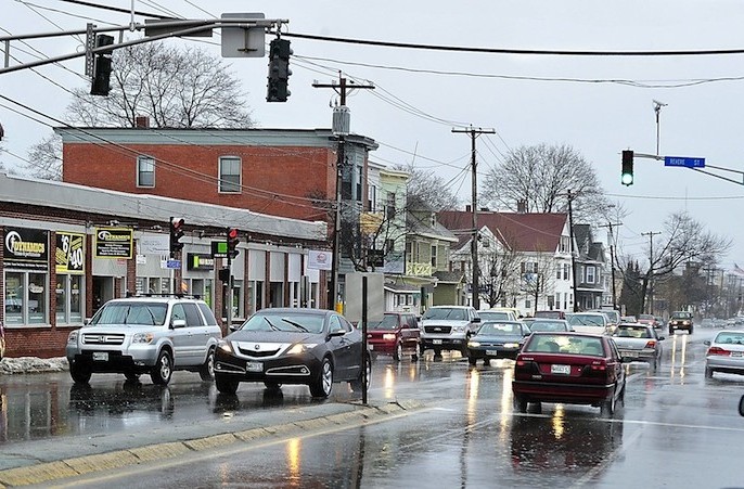 Cars pass through the Woodfords Corner intersection, one of the most congested in Portland. The City Council approved nearly $150,000 toward a traffic study and preliminary engineering to improve traffic flow and pedestrian safety at Woodfords Corner. (2012 Press Herald file photo)