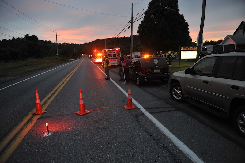 Emergency crews respond to a reported shooting at the Ross Township building that left four people dead, Monday, Aug. 5, 2013 in Saylorsburg, Pa. Monroe County emergency management director Guy Miller says the shooting happened Monday evening during Ross Township's regular monthly meeting. He says the gunman has been captured and is in state police custody. (AP Photo/Chris Post) saylorsburg;shooting;monroe county;pa