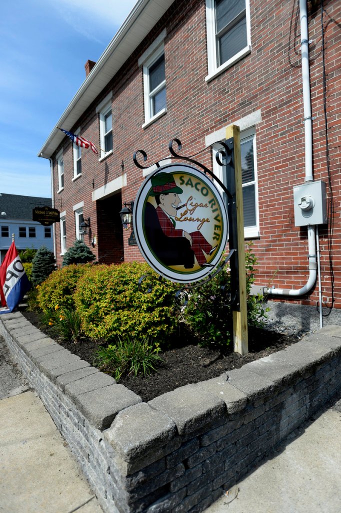 In this Wednesday, Aug. 7, 2013 photo, Saco River Cigars on Middle Street in Saco.